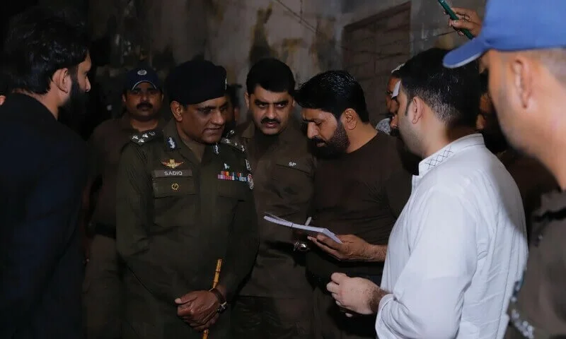 Police officials assess the roof collapse site in Aghapura, Multan, after an explosion on October 19, 2024.