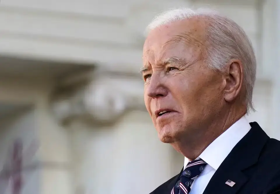 U.S. President Joe Biden speaks at a wreath-laying ceremony on Veterans Day at Arlington National Cemetery, Virginia, November 11, 2024.