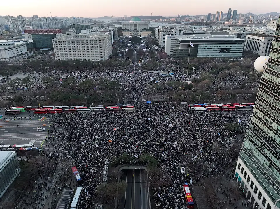 Protesters rally for the impeachment of South Korean President Yoon Suk Yeol after a brief martial law declaration, December 2024.