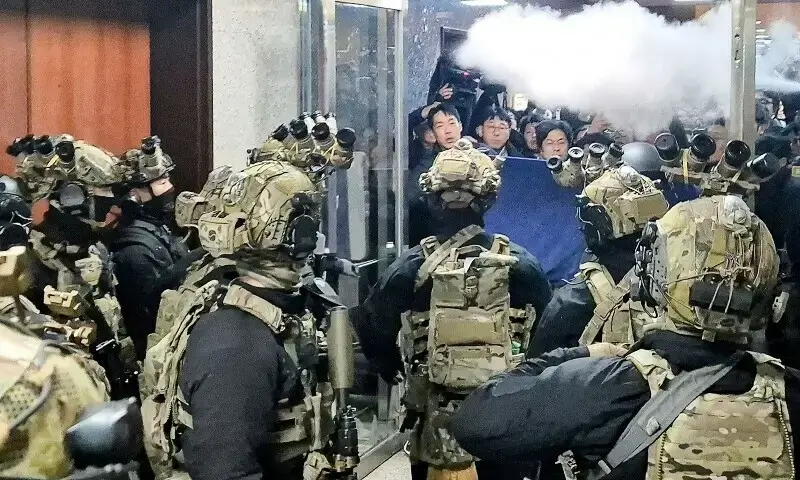 Soldiers attempt to enter the main hall of South Korea's National Assembly in Seoul on December 3.