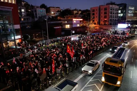 Protesters rally outside the official residence of impeached South Korean President Yoon Suk Yeol, opposing the court's arrest warrant approval.