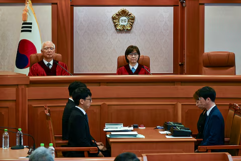 South Korean Constitutional Court Judges Lee Mi-son and Cheong Hyung-sik during the first preparatory hearing on President Yoon Suk Yeol's impeachment.